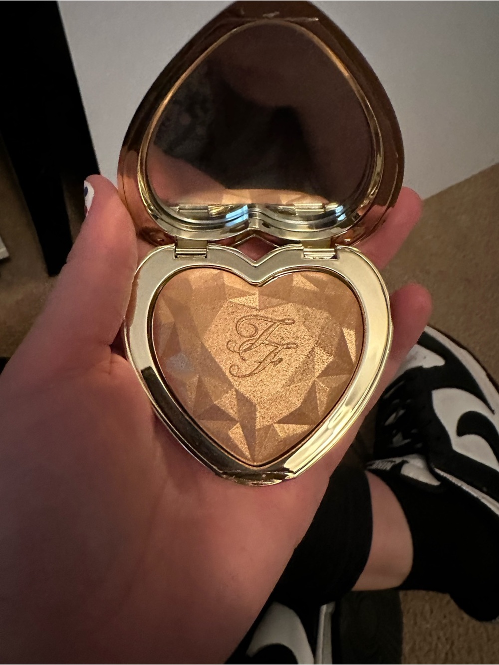 Too Faced Heart-Shaped Highlighter in the shade love light. *Discontinued item*